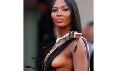 Naomi  a Cannes in Valentino: una bellezza esplosiva  che sfida il tempo 