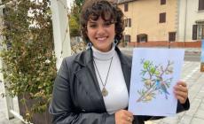 Dipingere all'aria aperta: la piazzetta del paese diventa "creativa"- Guarda le foto