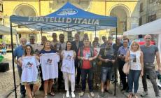 Il banchetto di FdI  sui temi di  fisco, giustizia, premierato e autonomia differenziata