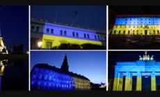 La Porta di Brandeburgo a Berlino e la Tour Eiffel a Parigi con i colori dell'Ucraina