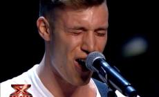 X Factor, il parmigiano Andrea Spigaroli va avanti (Con polemica)