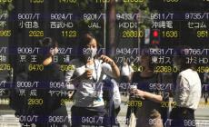 La reazione delle Borse: Asia volatile, male Milano