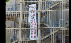 Striscione No vax sul Padiglione Barbieri, il sindaco Guerra e l'Ordine dei Medici: "Inqualificabile e antistorico"