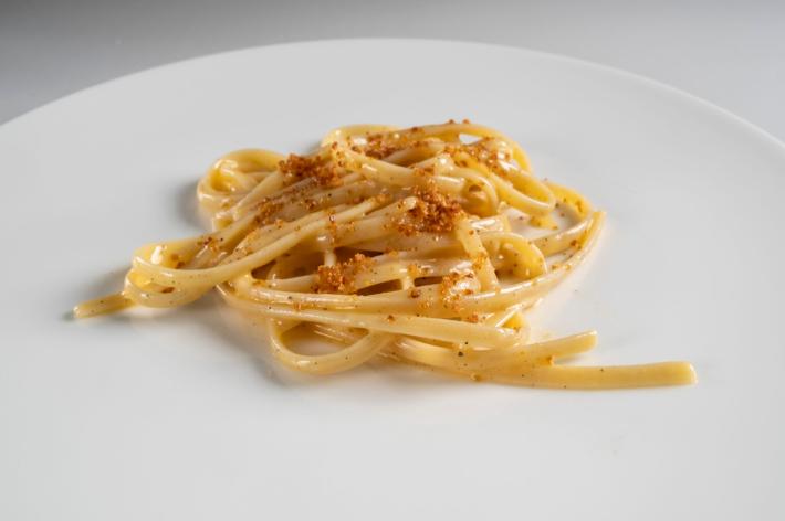 Linguine al Bronzo. Barilla, burro, pepe e trota