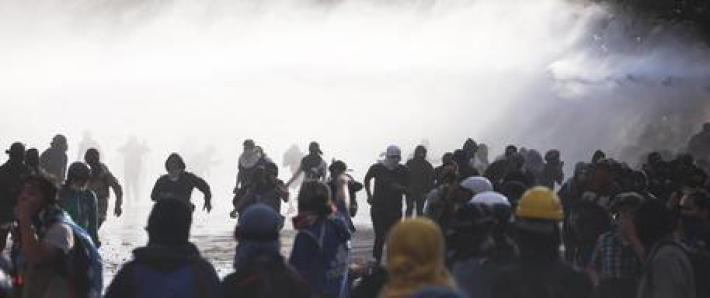 Cile, due corpi carbonizzati in un negozio dato alle fiamme