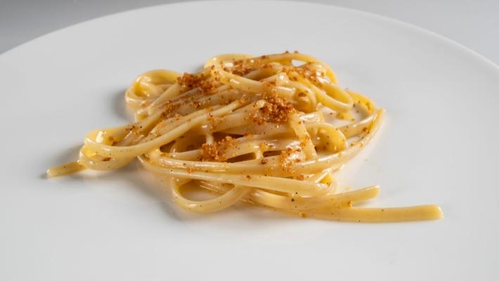 Linguine al Bronzo. Barilla, burro, pepe e trota